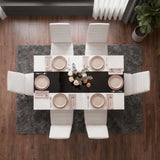 [6 Seater | White] White & Black Gloss 4-6 Seater Dining Table photographed from above, showing six place settings with blush plates and a floral centrepiece