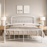 [White | King] Front view of a white metal bed frame with curved rails and taupe bedding in a bright bedroom.