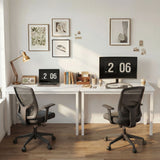 [100 x 50 cm] Home Office Desk 100cm shown as dual joined workstation in bright white room with two black mesh chairs, laptop and monitor setups, and gallery wall above