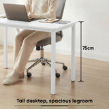 [100 x 50 cm] Home Office Desk 100cm height detail showing person seated at 75cm desk in slippers with laptop and legroom clearance annotated