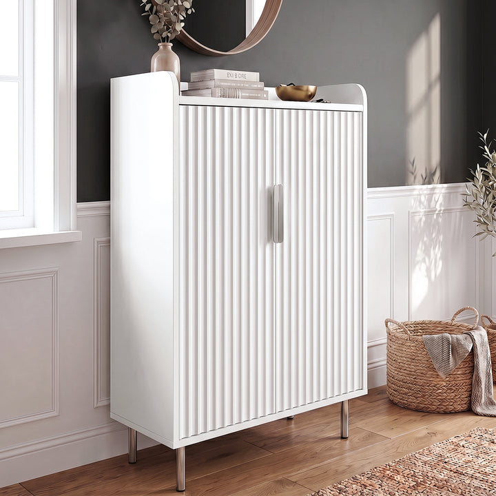 [White] Fluted White Painted 5 Tier Shoe Storage cabinet in styled hallway setting with wicker basket and decorative items on top tray