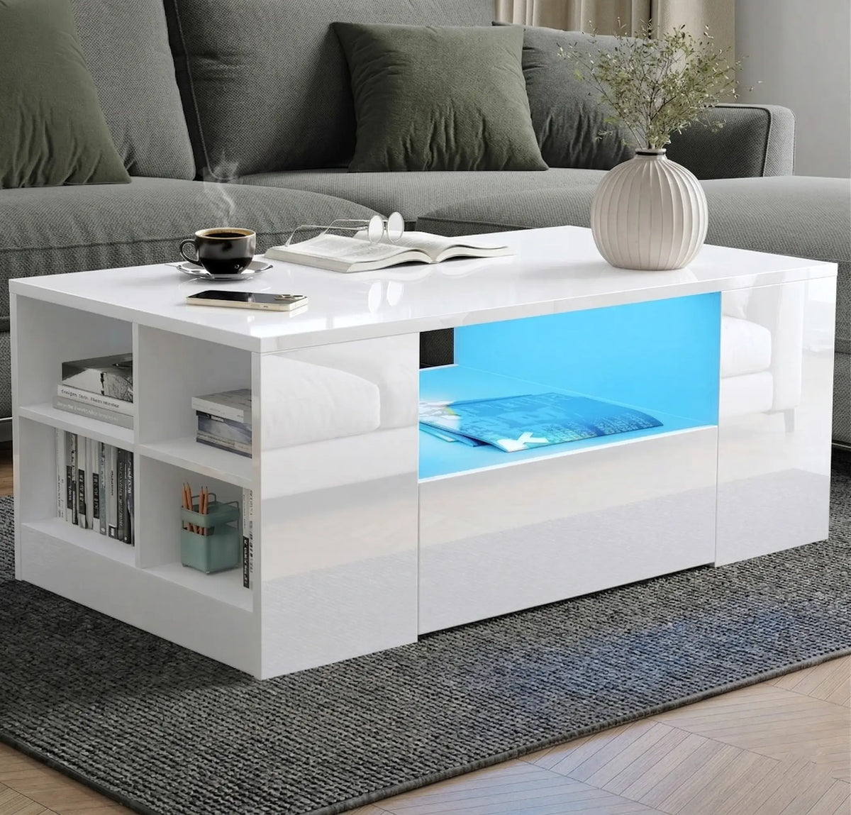 [White] High Gloss Coffee Table with LED angled living room showing blue LED central shelf, four-cube open side shelving with books