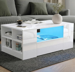 [White] High Gloss Coffee Table with LED angled living room showing blue LED central shelf, four-cube open side shelving with books
