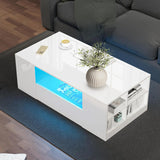 [White] High Gloss Coffee Table with LED overhead view showing blue LED central shelf, open end cube shelving with magazines, ribbed vase