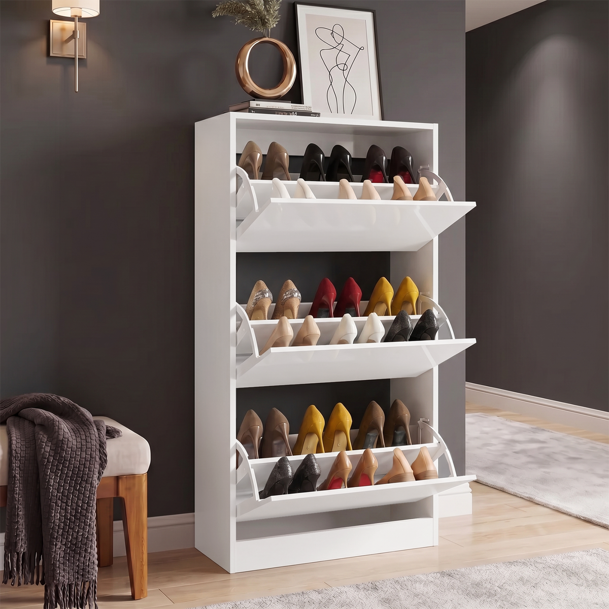 [White] High Gloss 3 Door Shoe Cabinet with all three compartments open displaying three tiers of heels in a dark hallway