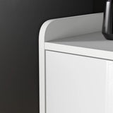 [White] Top-edge detail shot of white high gloss TV unit, vase silhouette right, dark backdrop