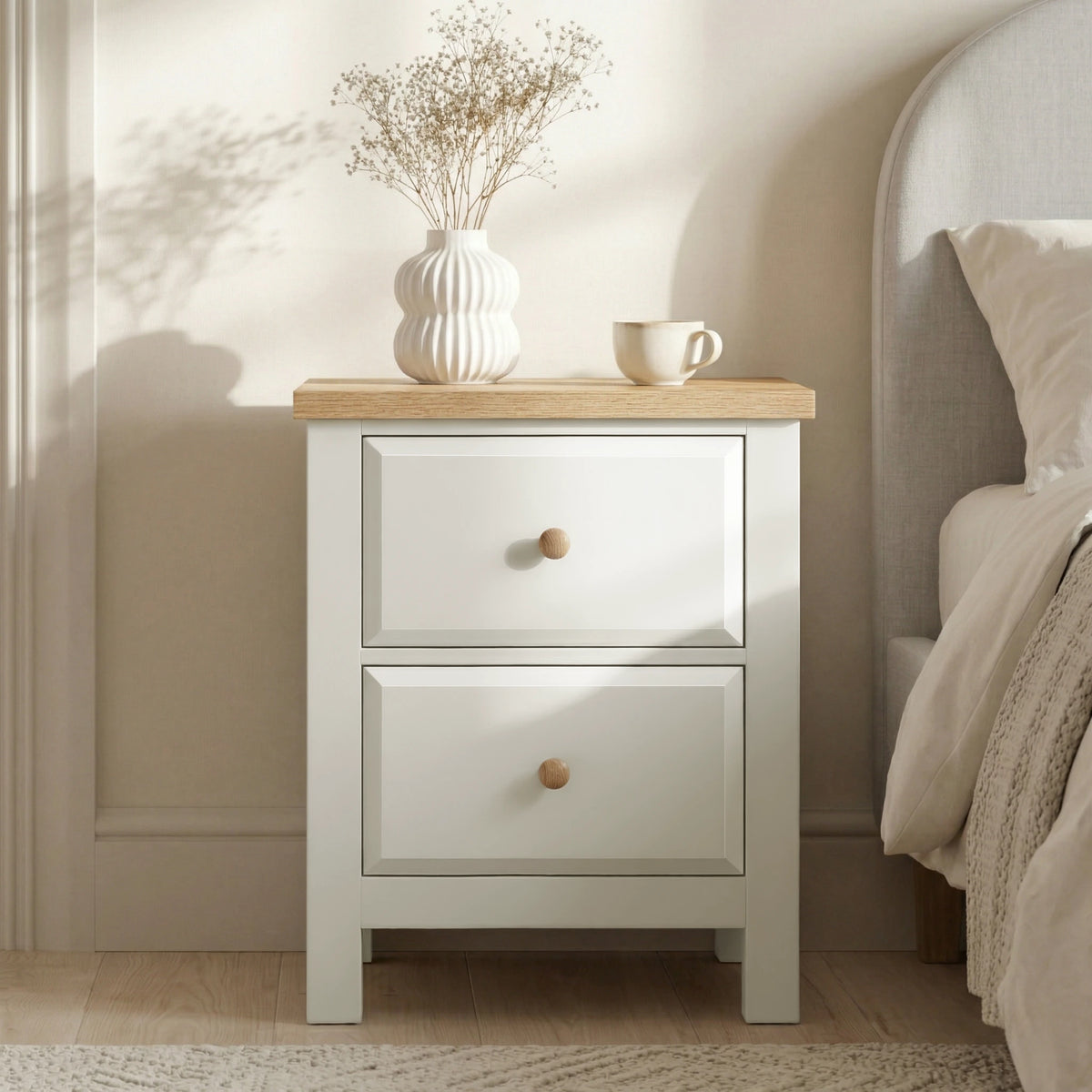 [White] 2 drawers nightstand with wooden top in a bedroom setting