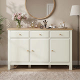 [White] Haven sideboard front view with oak top, framed doors, drawers, round mirror, flowers, lamp, and vases.
