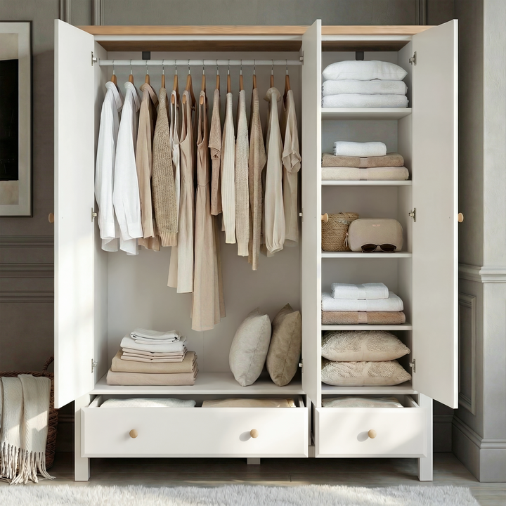 [White] Haven wardrobe with doors open revealing full hanging rail storage space and interior shelf arrangement