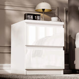 [White]  single white high gloss bedside table with two handleless drawers beside bed with lamp on top