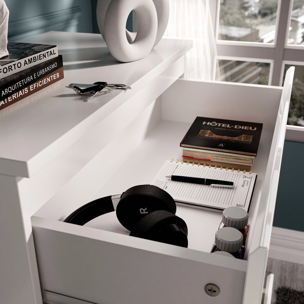 [White] Close-up of open drawer in white high gloss chest, showcasing storage for headphones, notebooks, and accessories.