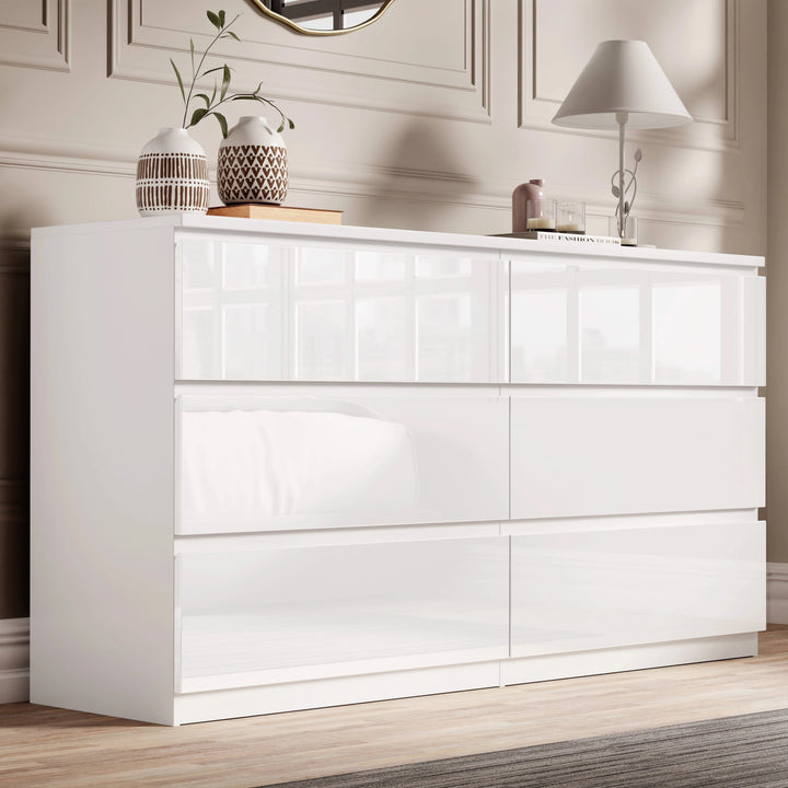 [White] White high gloss 6 drawer chest of drawers with woven basket and stems styled on top.