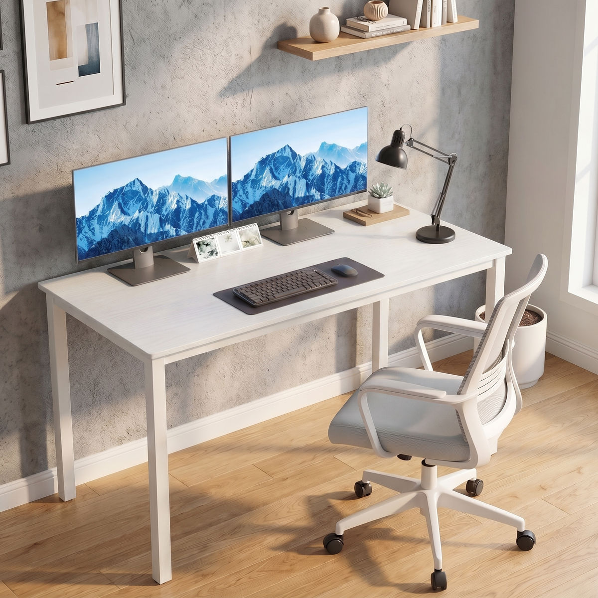 [120 x 50 cm] Home Office Desk 120cm angled in grey concrete-effect office with dual monitor setup, keyboard, black lamp, succulent, floating oak shelf above, and grey mesh chair