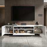 [White] White Kystra TV unit shown with internal storage on view: upright books, woven baskets and centre AV equipment