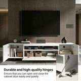 [White] Kystra TV unit doors-open lifestyle shot with a lower-right inset close-up of the metal cabinet hinge