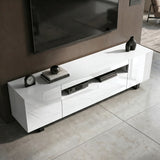 [White] Kystra white TV unit from above showing centre open shelf with AV box and cable, doors closed at sides