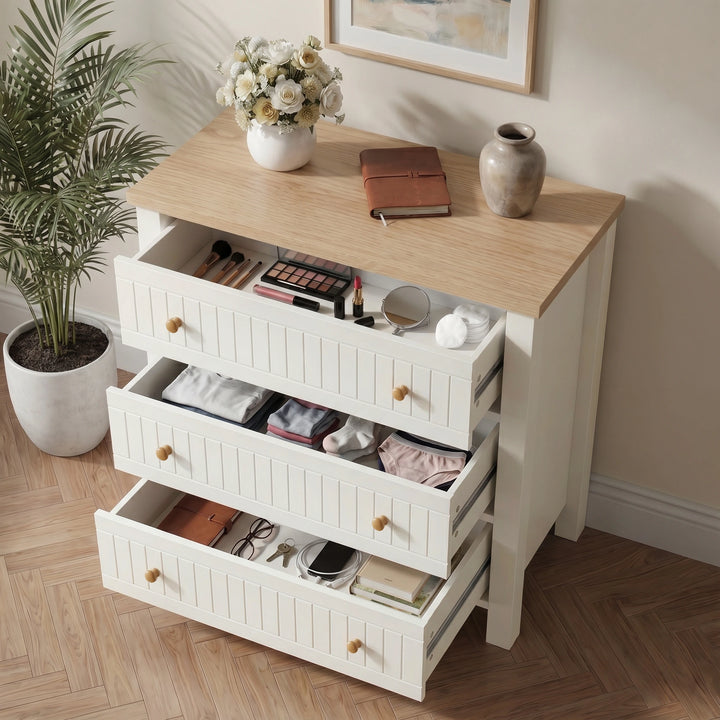 [White] Linra Painted 4 Piece Bedroom Furniture Set chest of drawers with all three drawers open showing makeup, folded clothing, and accessories