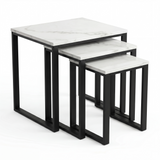 [White Marble] Stackora set of 3 nest tables with industrial black metal frame shown nested together front-facing on white background