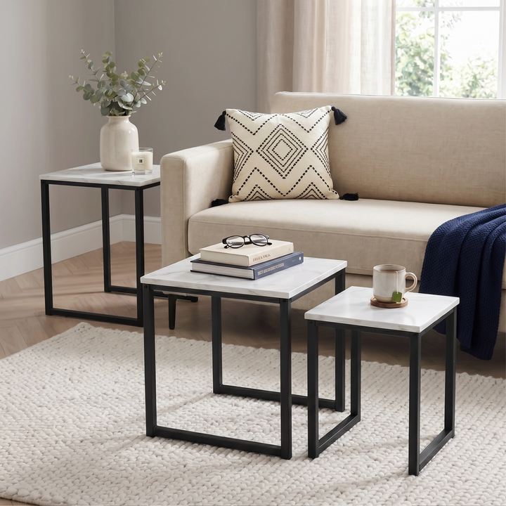 [White Marble] Stackora nest of 3 tables used separately as side and coffee tables across living room with sofa and rug styling