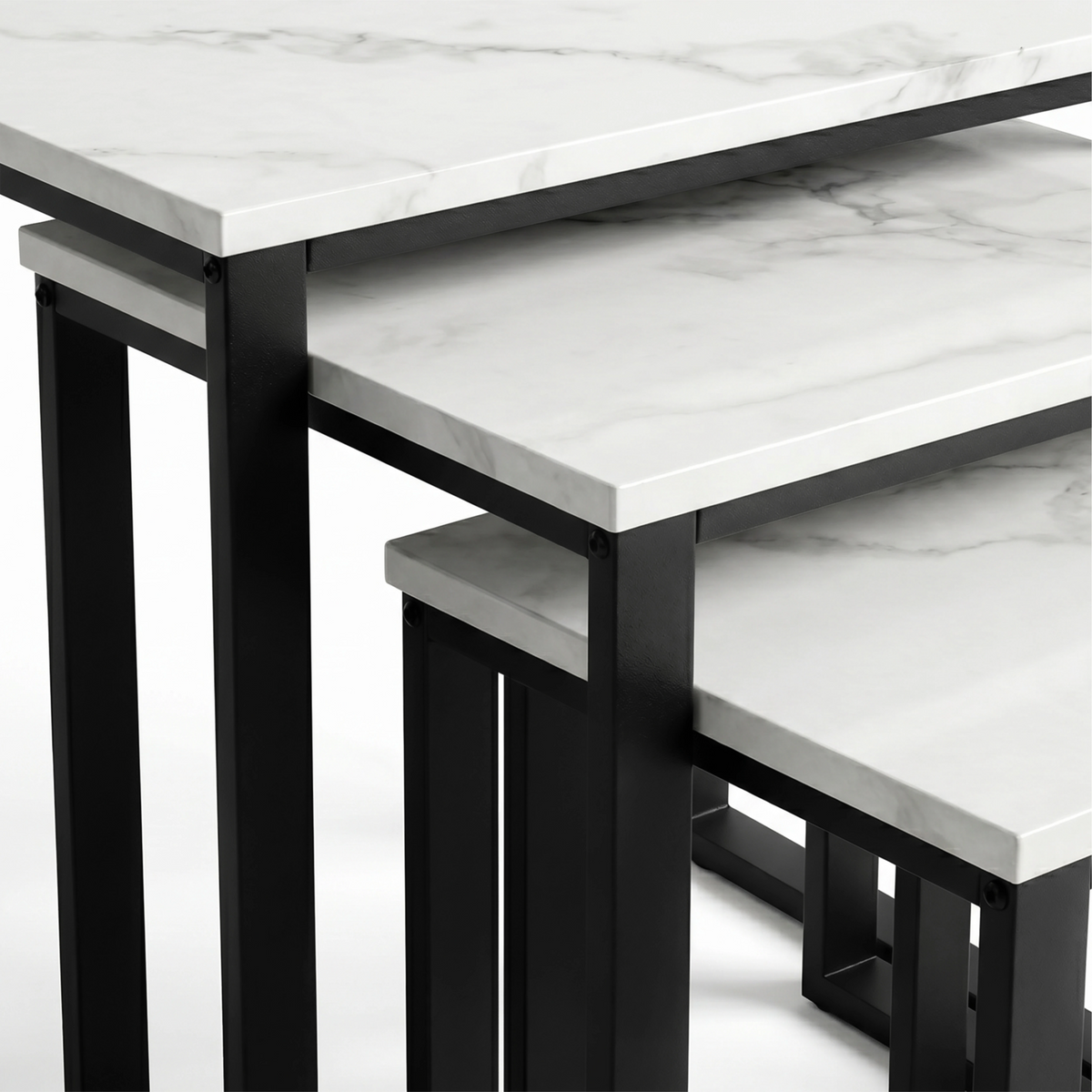 [White Marble] Stackora nest of 3 tables close-up showing marble effect tabletop thickness and black metal frame corner joints