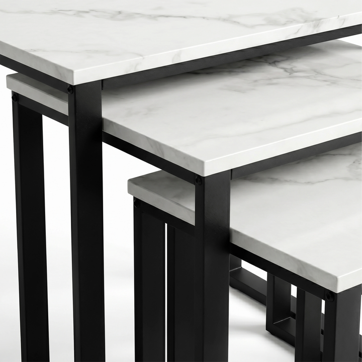 [White Marble] Stackora nest of 3 tables close-up showing marble effect tabletop thickness and black metal frame corner joints
