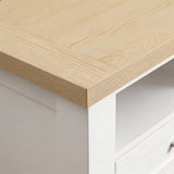 [White] Oskara White Painted TV Unit with Storage close-up corner detail of the natural oak top surface showing wood grain texture, mitred edge
