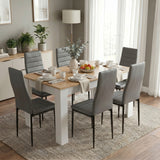 [6 Seater | Grey] White & Pine 4-6 Seater Dining Table and Chairs Set in an elevated side view showing six plates, individual cutlery settings, and a central fruit bowl