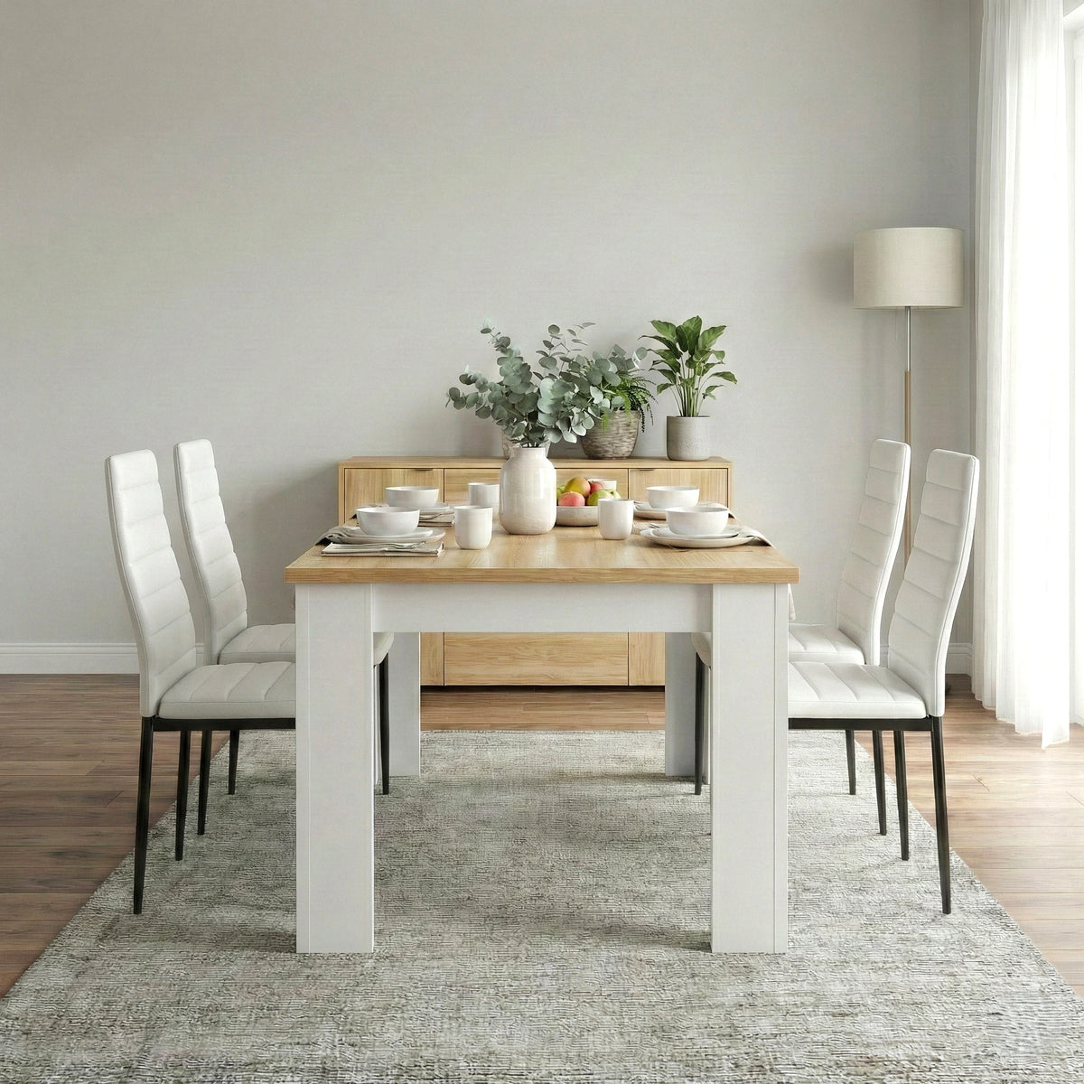 [4 Seater | White] Dining Table and Chairs Set with four white padded chairs around a pine-top table in a minimal grey dining room with sideboard
