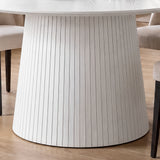 [White] Close-up of round pedestal dining table slatted pedestal base below the top