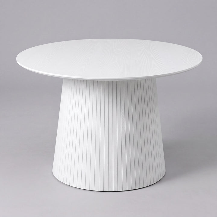 [White] 120cm round pedestal dining table with tapered slatted pedestal base in a studio shot