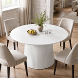 [White] Top view of round pedestal dining table with beige chairs and tableware
