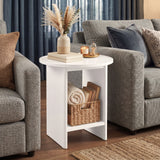[White] Small Round Side Table with Shelf Living Room positioned between two grey sofas with botanical vase on top and wicker basket on lower shelf