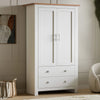 [White] Shaker double wardrobe with oak top, two panel doors and two cup-handle drawers, artwork on left