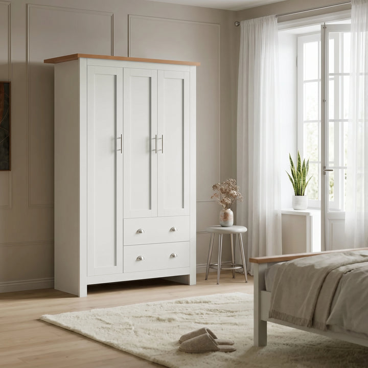[White] Shaker Triple Wardrobe With Drawers And Shelves closed showing three white doors and an oak wood top.