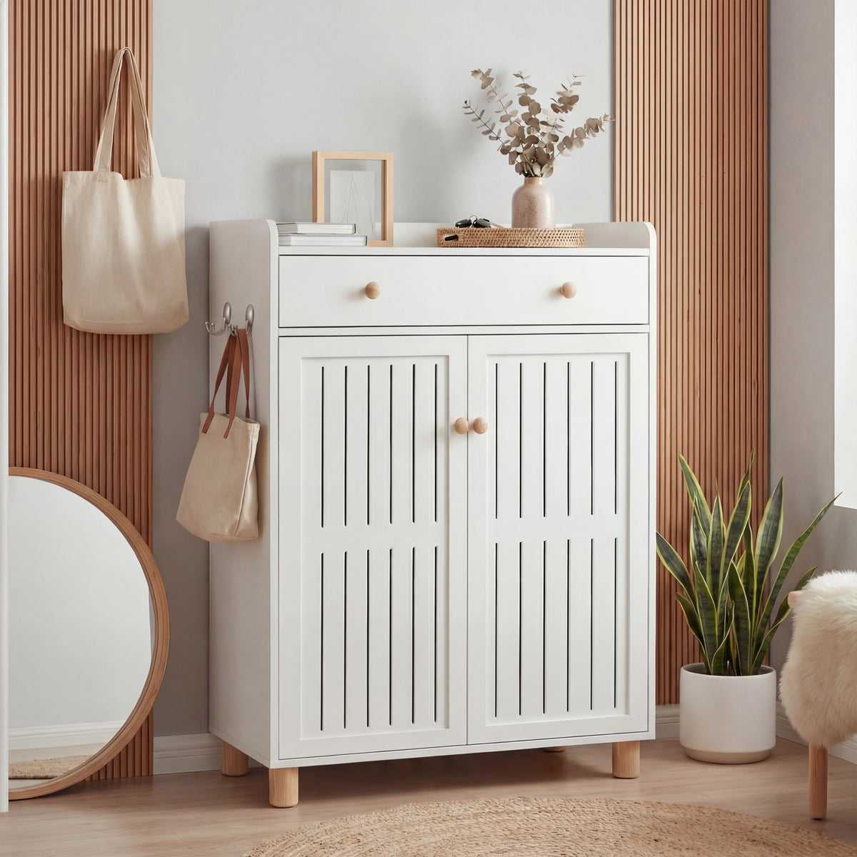 [White] Compact entryway white shoe storage with a slatted-pattern door and a top drawer for small items
