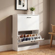 [White] White shoe cabinet 2 door with top pull-down drawer open; decor and planter on the cabinet top
