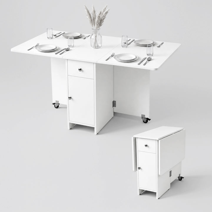 [White] Space saving folding dining table for four shown with opened leaves & shown compact with both leaves folded on wheels