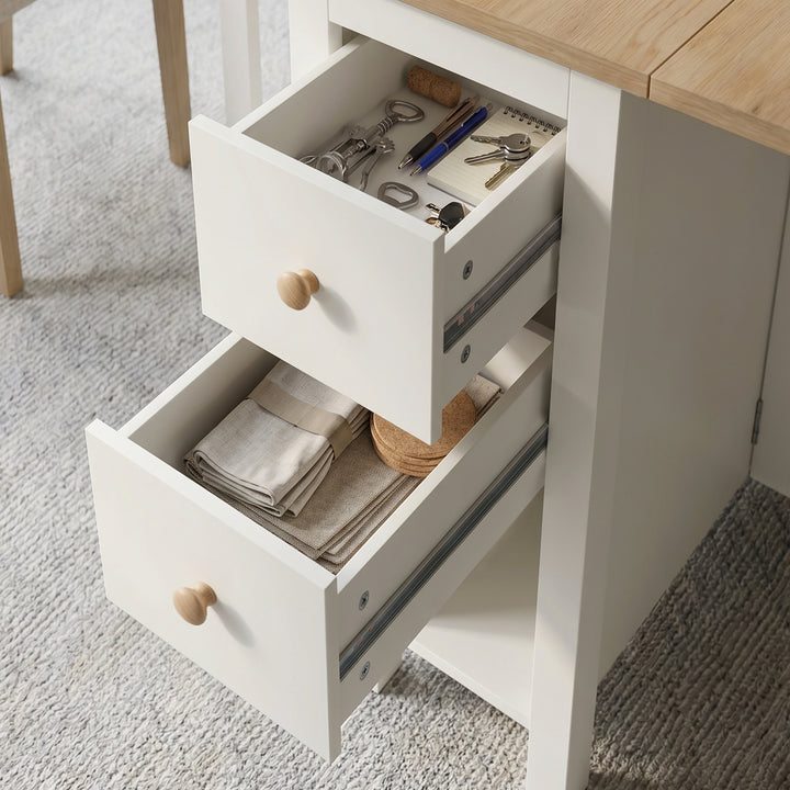 [150cm | White] Stovra Drop Leaf Dining Table both drawers open showing cutlery and stationery in top and linens below