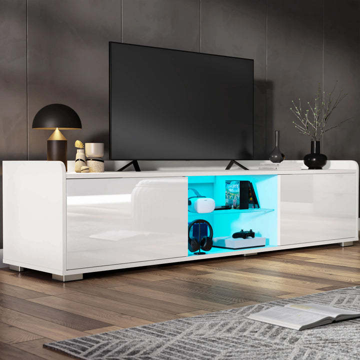 [White] TV stand unit in white gloss with wall-mounted television above and blue LED lit central shelf