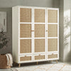 [White] Wovena rattan wardrobe three-quarter angle in a styled bedroom with natural light and wall shadows