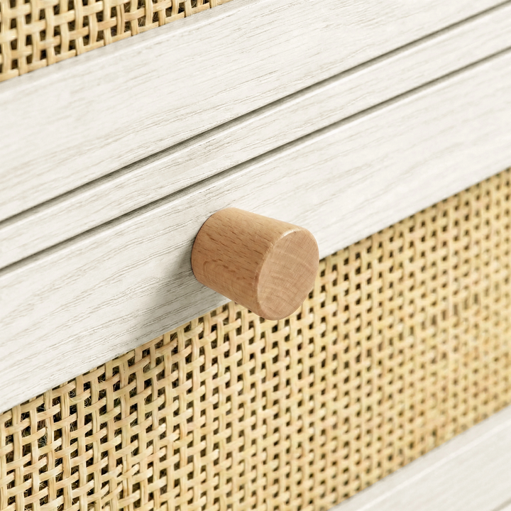 [White] Close view of Wovena rattan wardrobe knob junction where pine pull meets white frame and rattan panel