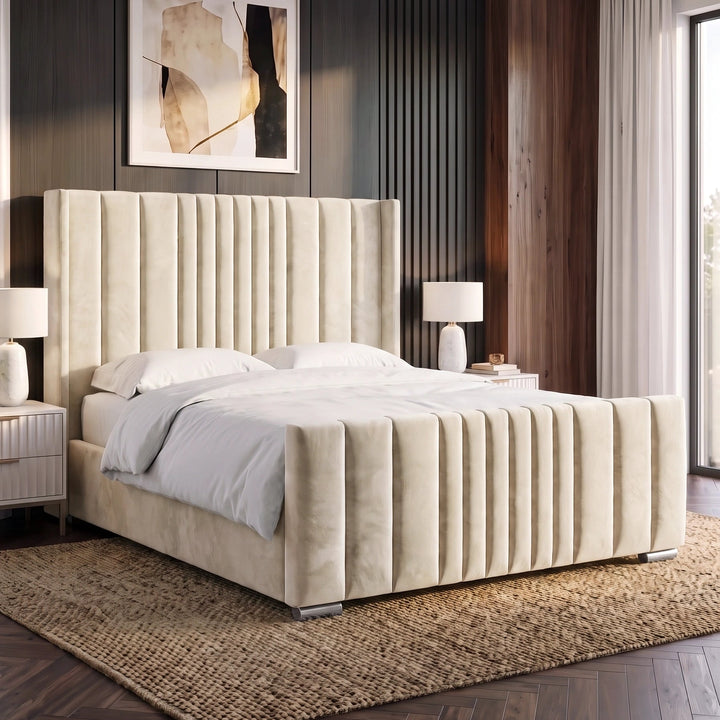 [Double | Beige] Ottoman bed from the side with tall winged headboard deep vertical fluted channels
