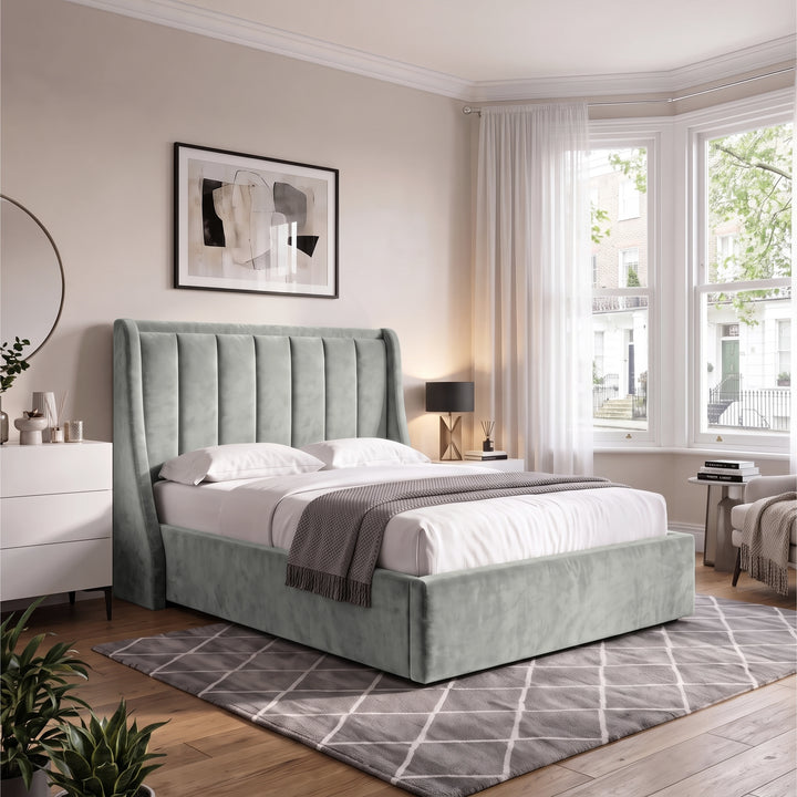 [Light Grey | Double] Winged ottoman storage bed angled room view with winged vertical panel headboard and bedding