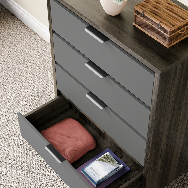 [Wooden Grey+Grey] finish wooden chest of drawers with the bottom drawer open, showing folded cloth and books inside