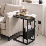 [Wooden Grey]sofa side table side view with wooden grey-effect top, socket panel, tea, power cable and storage pouch
