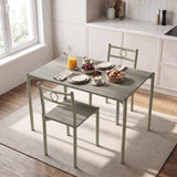 [Wooden Grey] Kitchen breakfast scene with the table set for two, orange juice, berries, bread, plates and cutlery