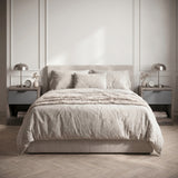 [Wooden Grey+Grey] Skova bedside tables styled as a matching pair flanking an upholstered bed in a bright bedroom