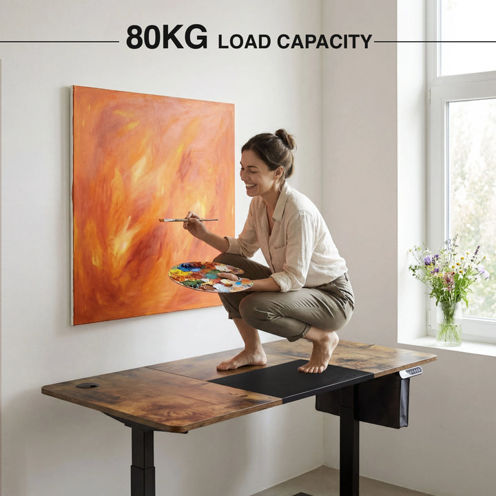 [110cm x 60cm] Load-capacity demo with the 110cm rustic desk supporting a kneeling adult painter at 80kg total weight