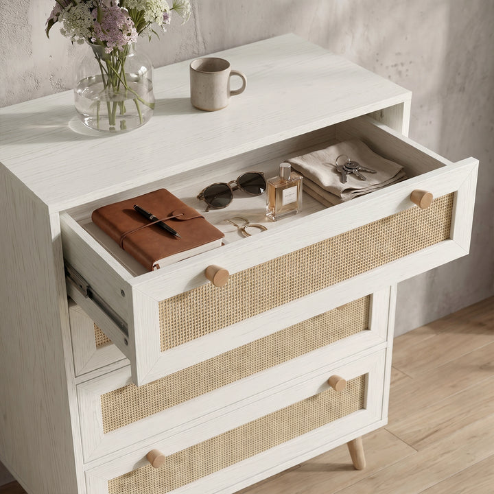 [White] Woven Rattan 4 Drawer Chest of Drawers, White high-angle look focusing on the top drawer open with everyday essentials.