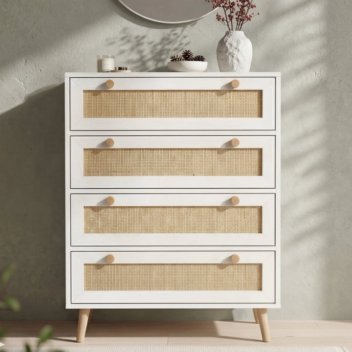 [White] Wovena rattan bedroom furniture set chest in room with oak knobs, tapered legs and round mirror behind
